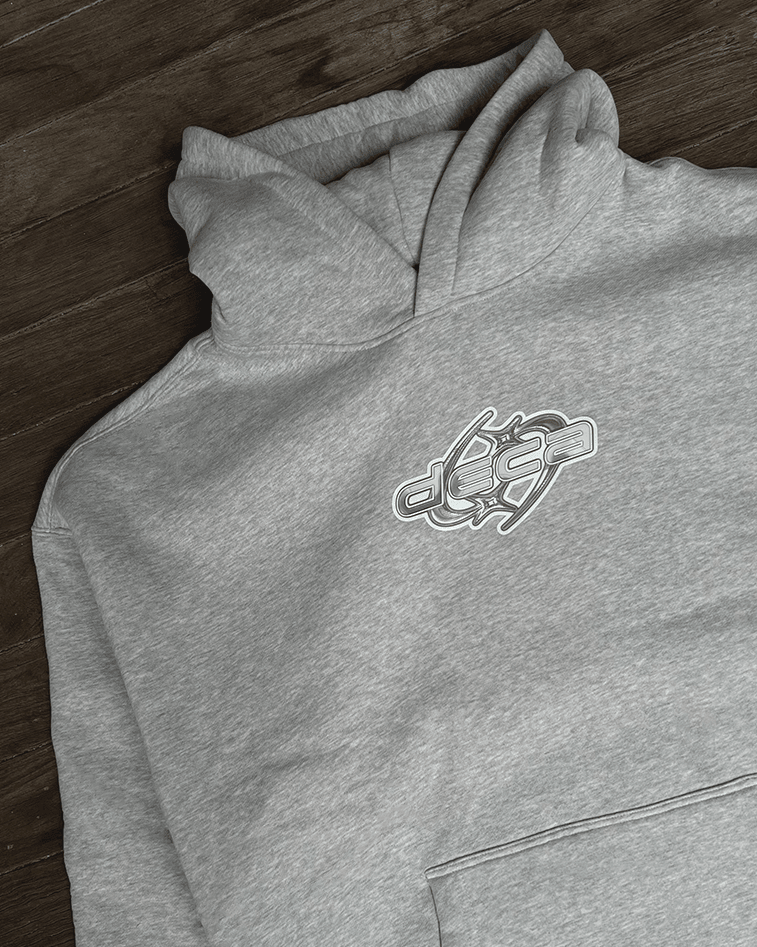 Close-up of white star logo print on heather grey hoodie