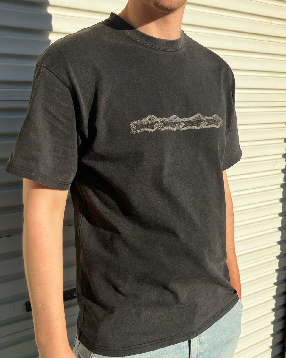 Model wearing washed black Grunge Stars vintage tee