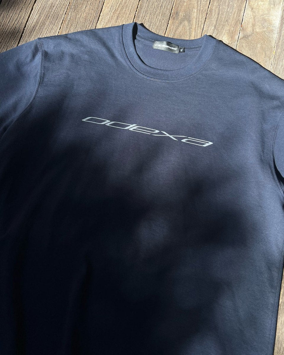 Navy heavyweight ODEXA logo tee, angled flat lay