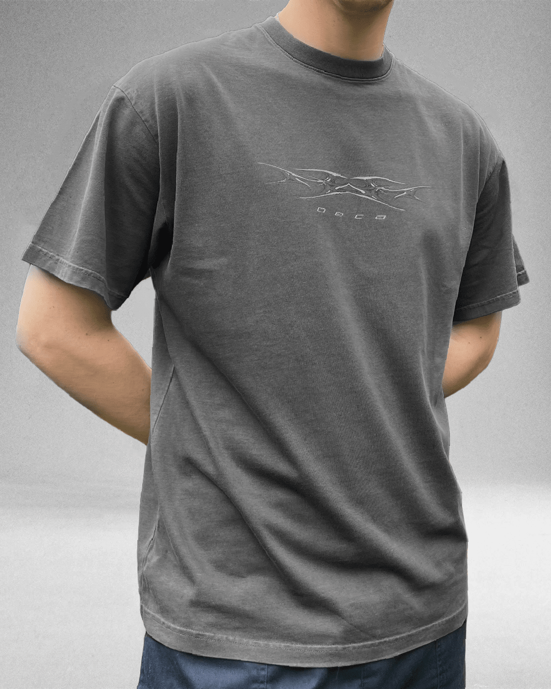 Model wearing washed grey Sharp Grey vintage tee