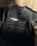 Washed black vintage tee with chrome DECA logo print, flat lay