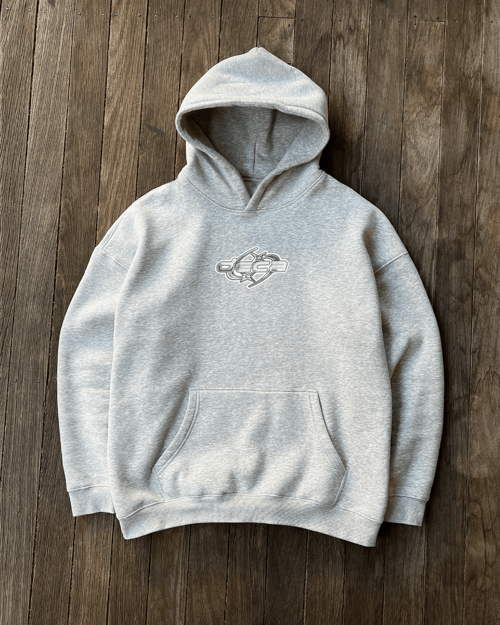 Heather grey White Star Logo hoodie on wooden floor, flat lay