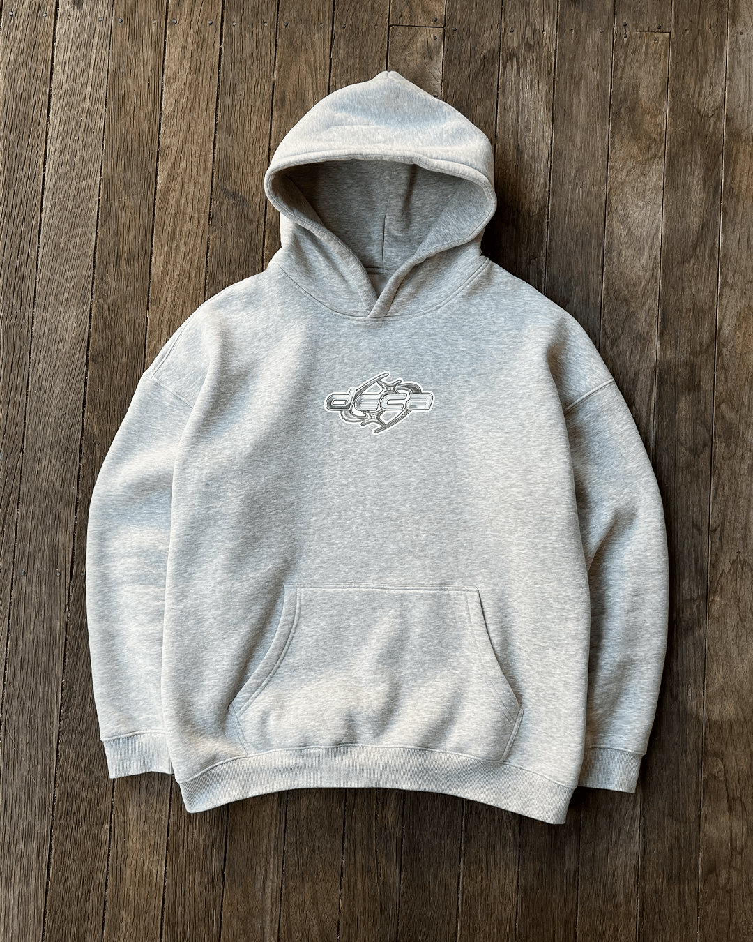 Heather grey White Star Logo hoodie on wooden floor, flat lay