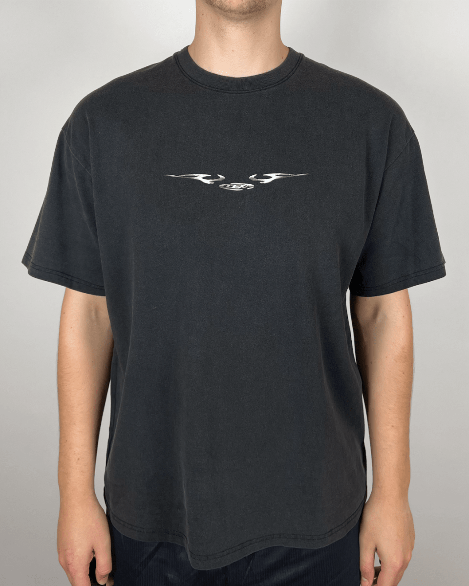 Model wearing washed black Chromatic Sigil vintage tee