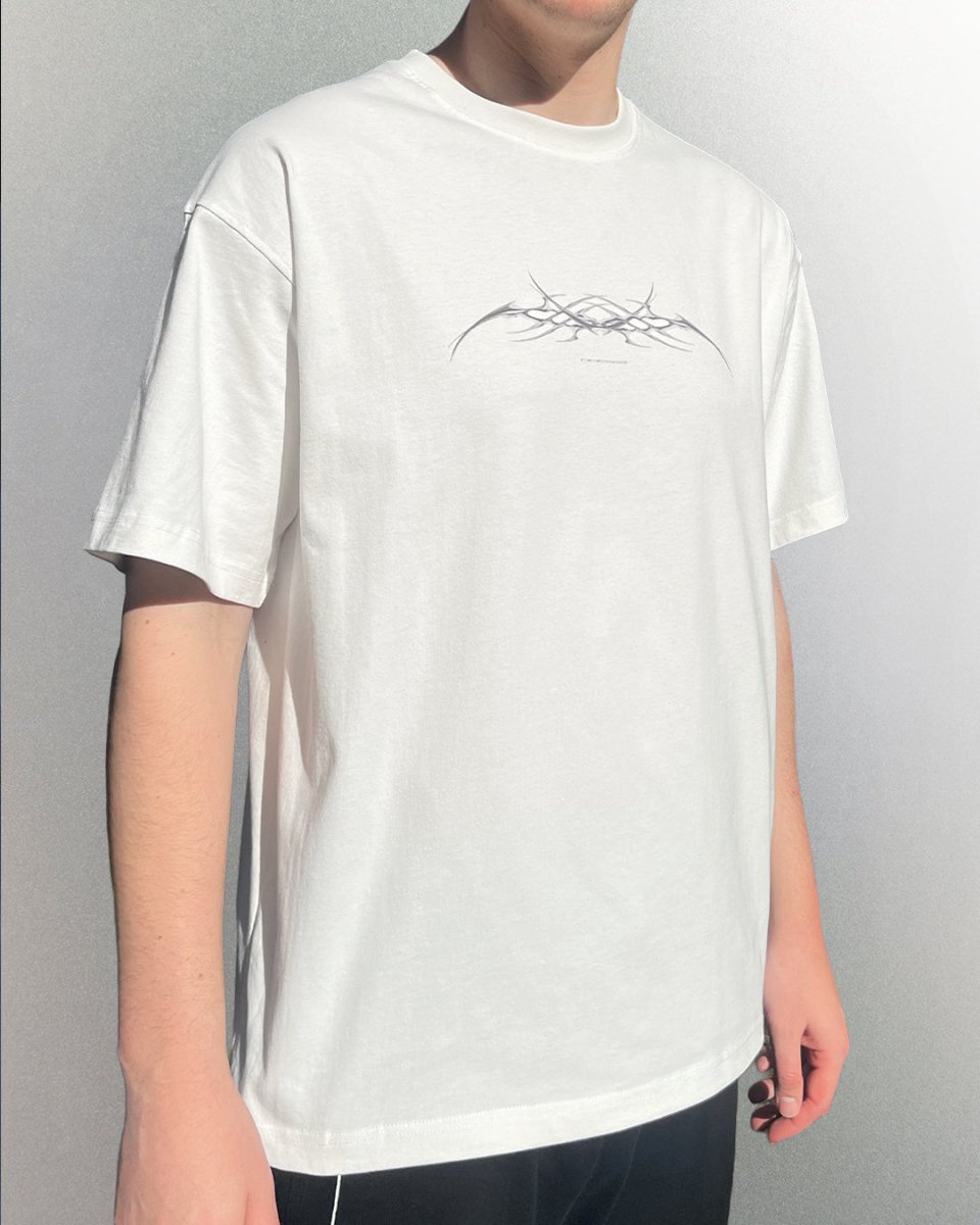 Model wearing white Chrome Sigil White vintage tee