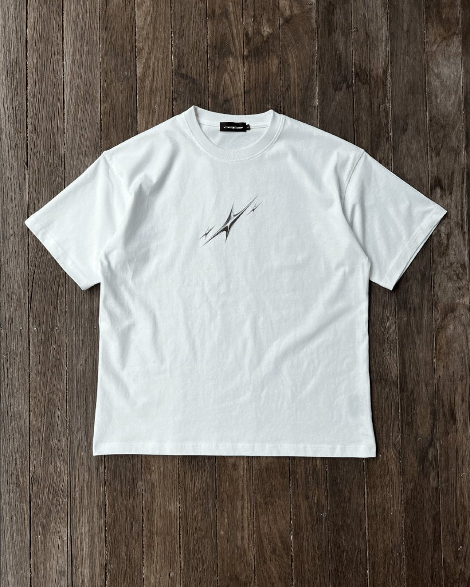White vintage tee with black chrome star print, flat lay