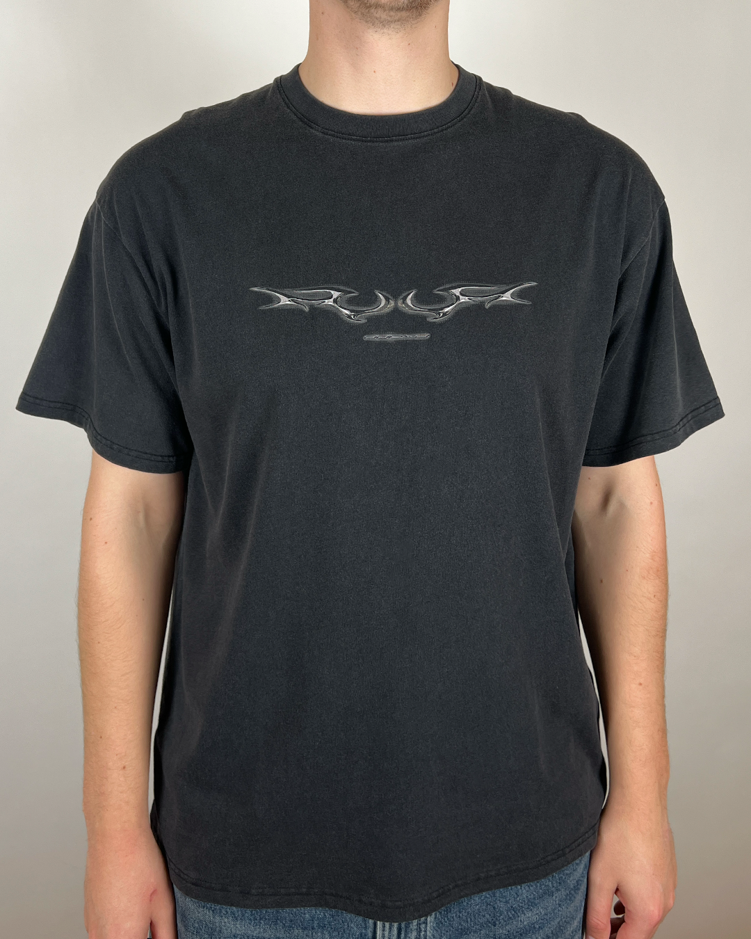 Model wearing washed black Digital Chrome Sigil vintage tee