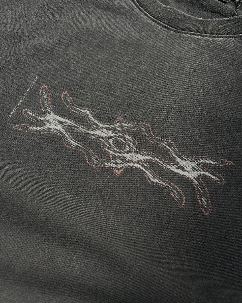 Close-up of red and white digital decay tribal print