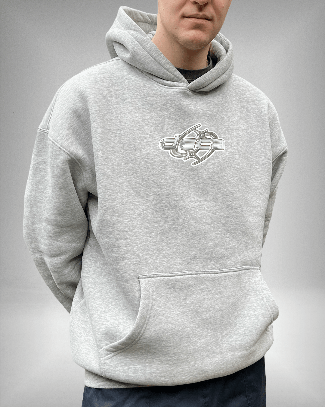 Model wearing heather grey White Star Logo oversized hoodie