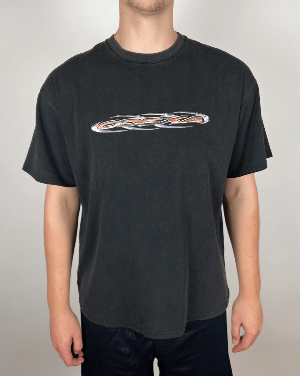 Model wearing washed black Light Logo vintage tee