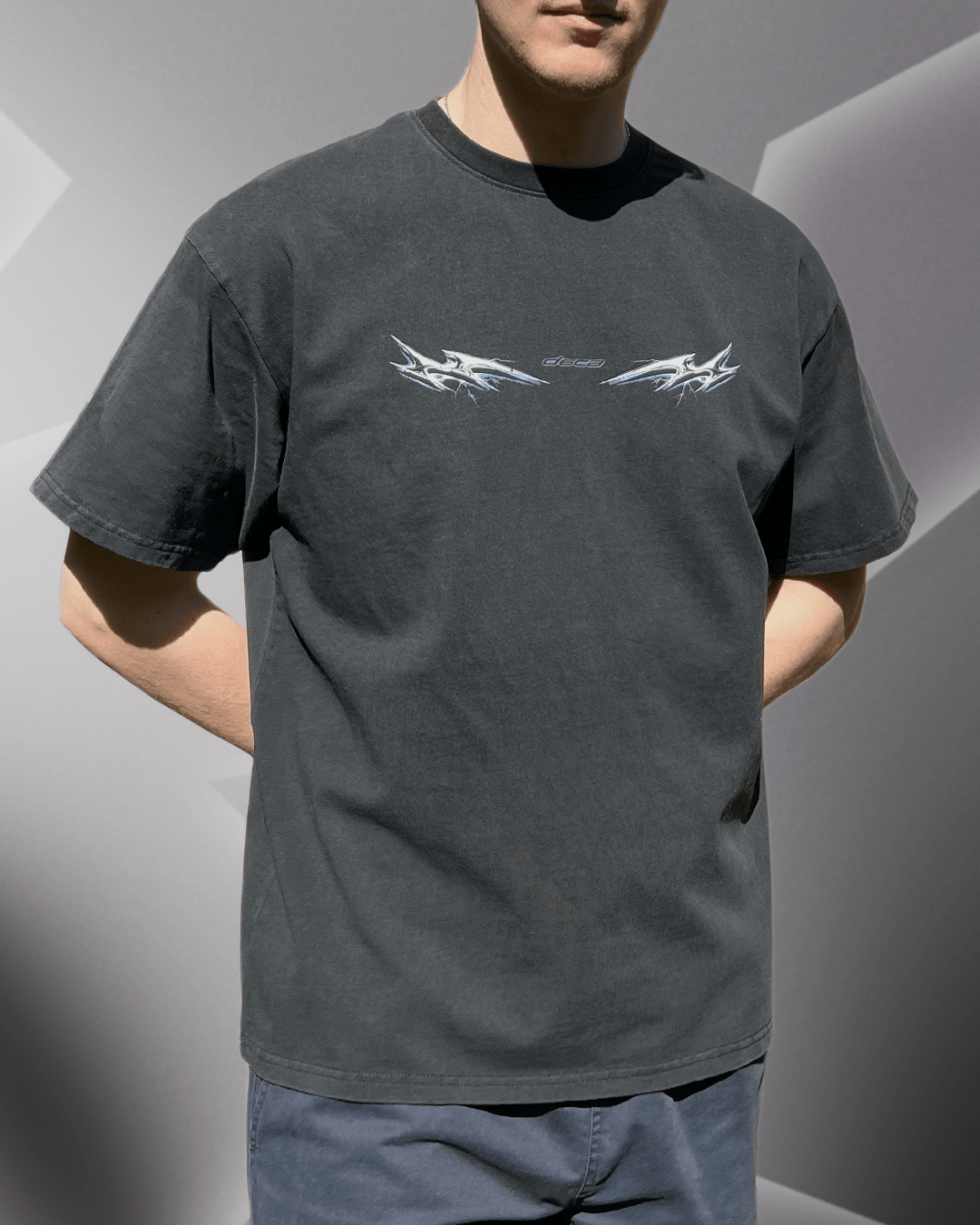 Model wearing washed black Lightning Chrome vintage tee