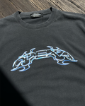 Washed black vintage tee with blue chrome tribal ODEXA print, front view