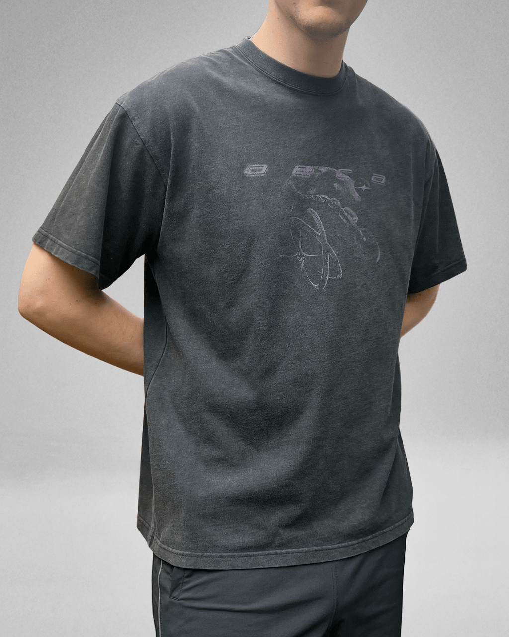 Model wearing washed black Grunge Planet vintage tee
