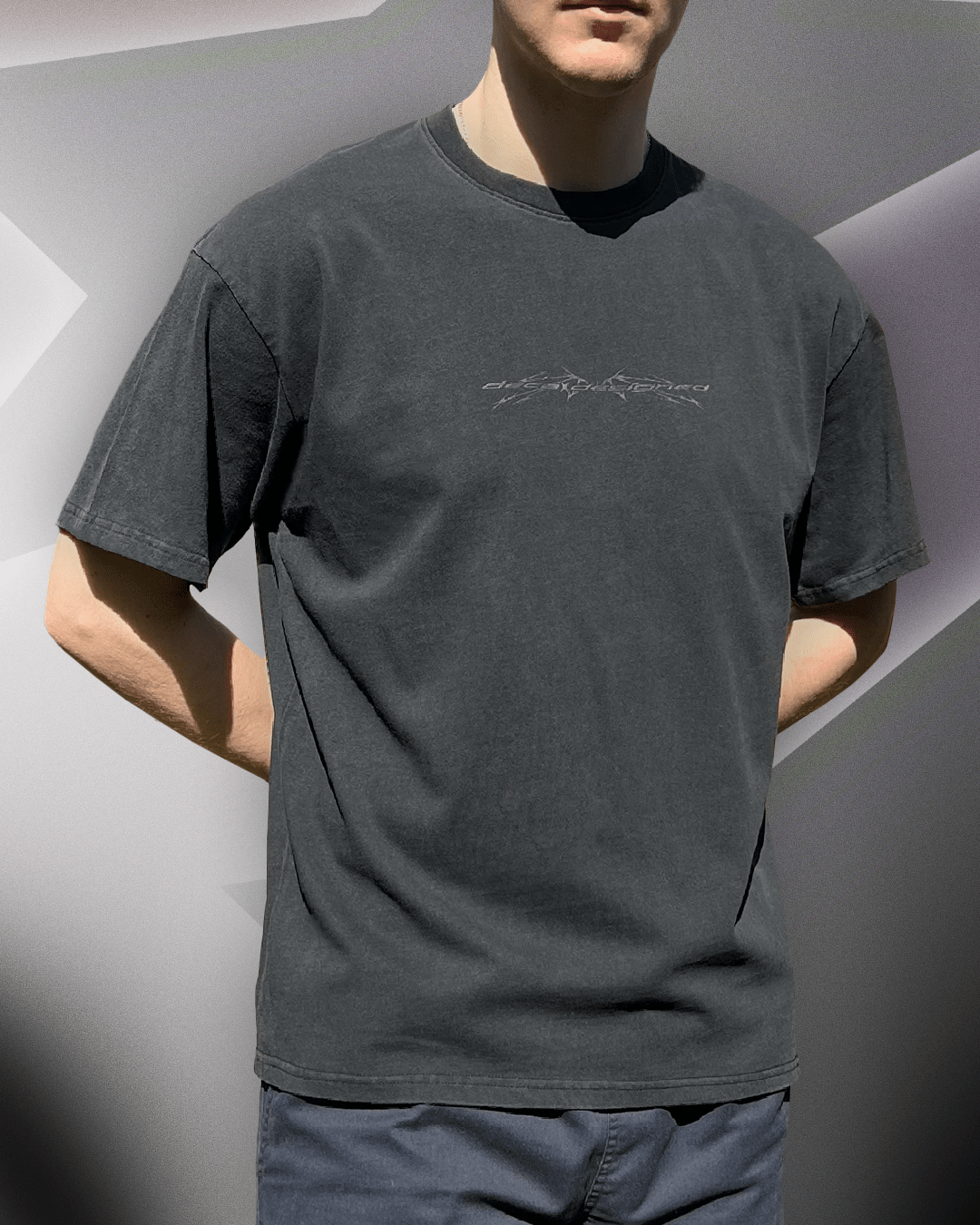 Model wearing washed black Sharp Black vintage tee, front view
