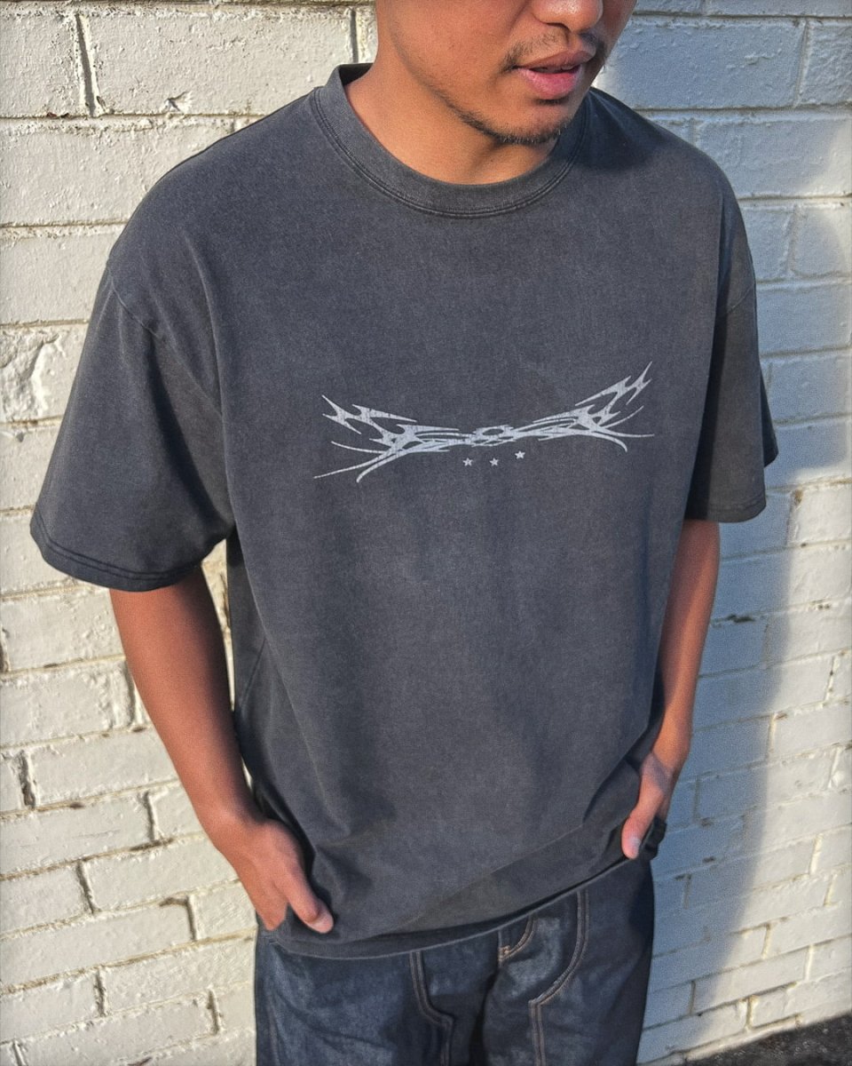 Model wearing washed black Sigil 1 vintage tee