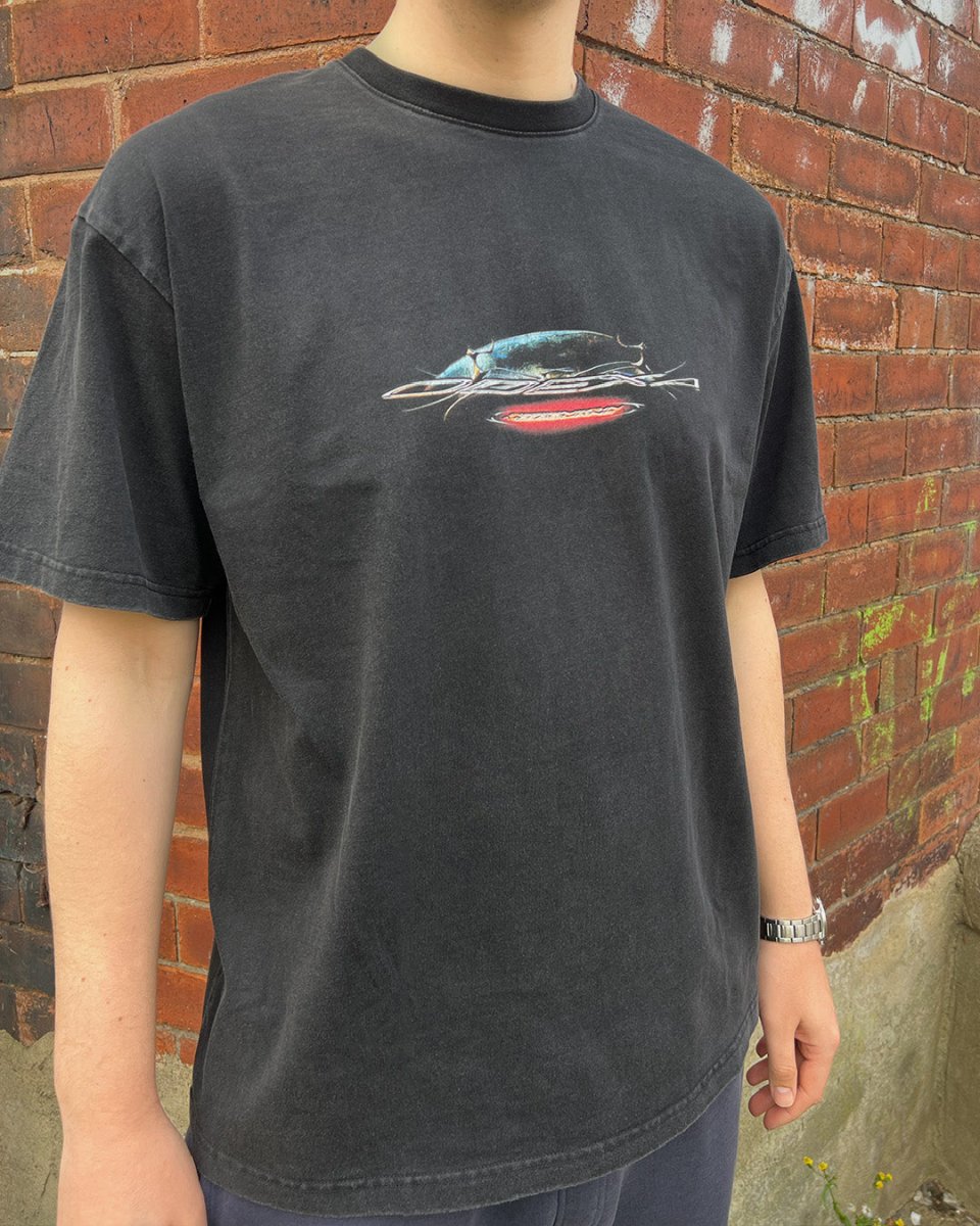 Model wearing washed black Space Logo vintage tee
