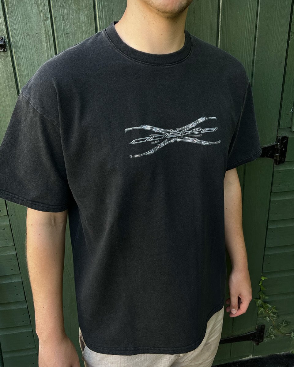 Model wearing washed black Tech Logo vintage tee